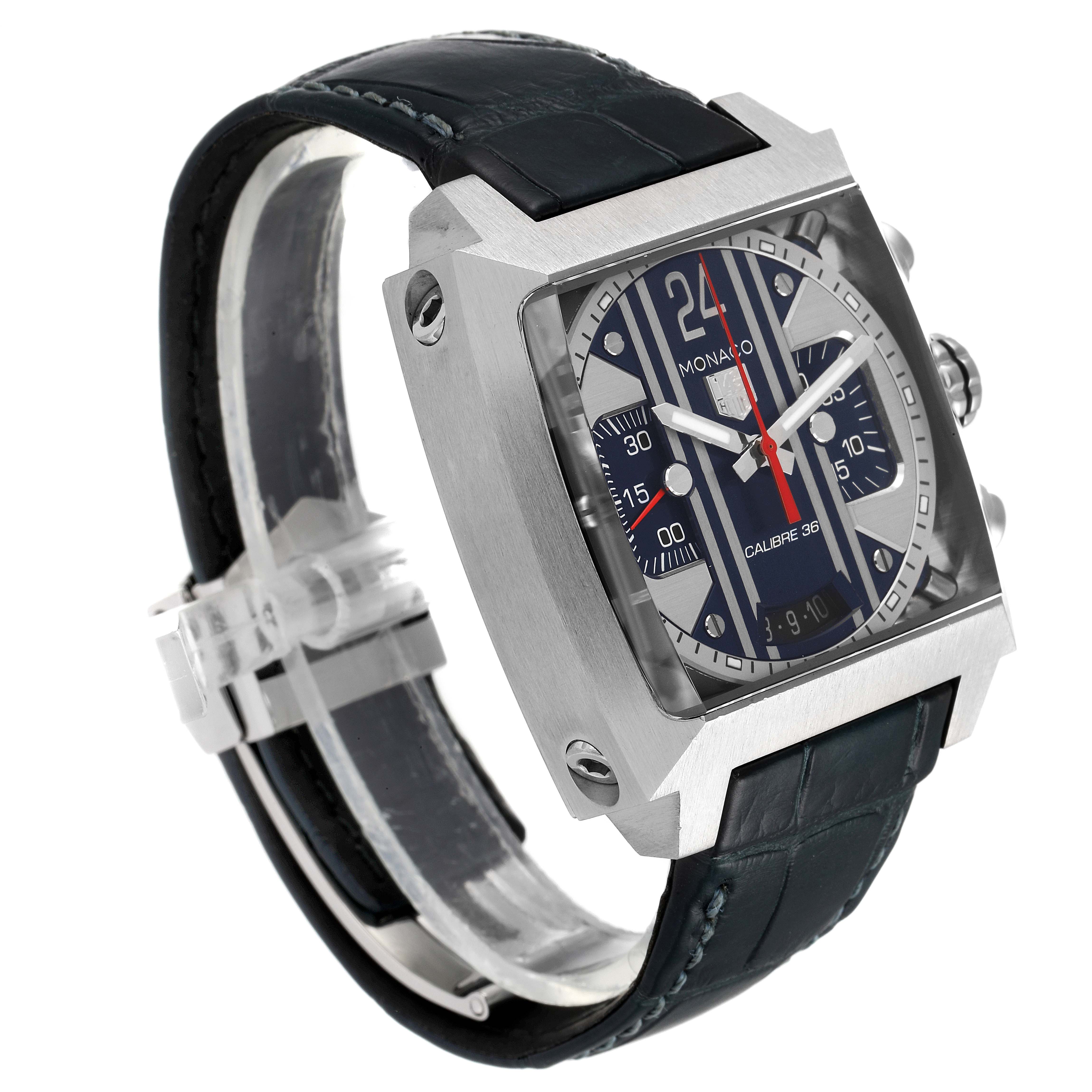 The image shows a side and front angle of the Tag Heuer Monaco CAL5111.FC6299 Men
s Stainless Steel Blue Dial CAL5111.FC6299 Men
s Stainless Steel Blue Dial watch, highlighting its square face and leather strap.