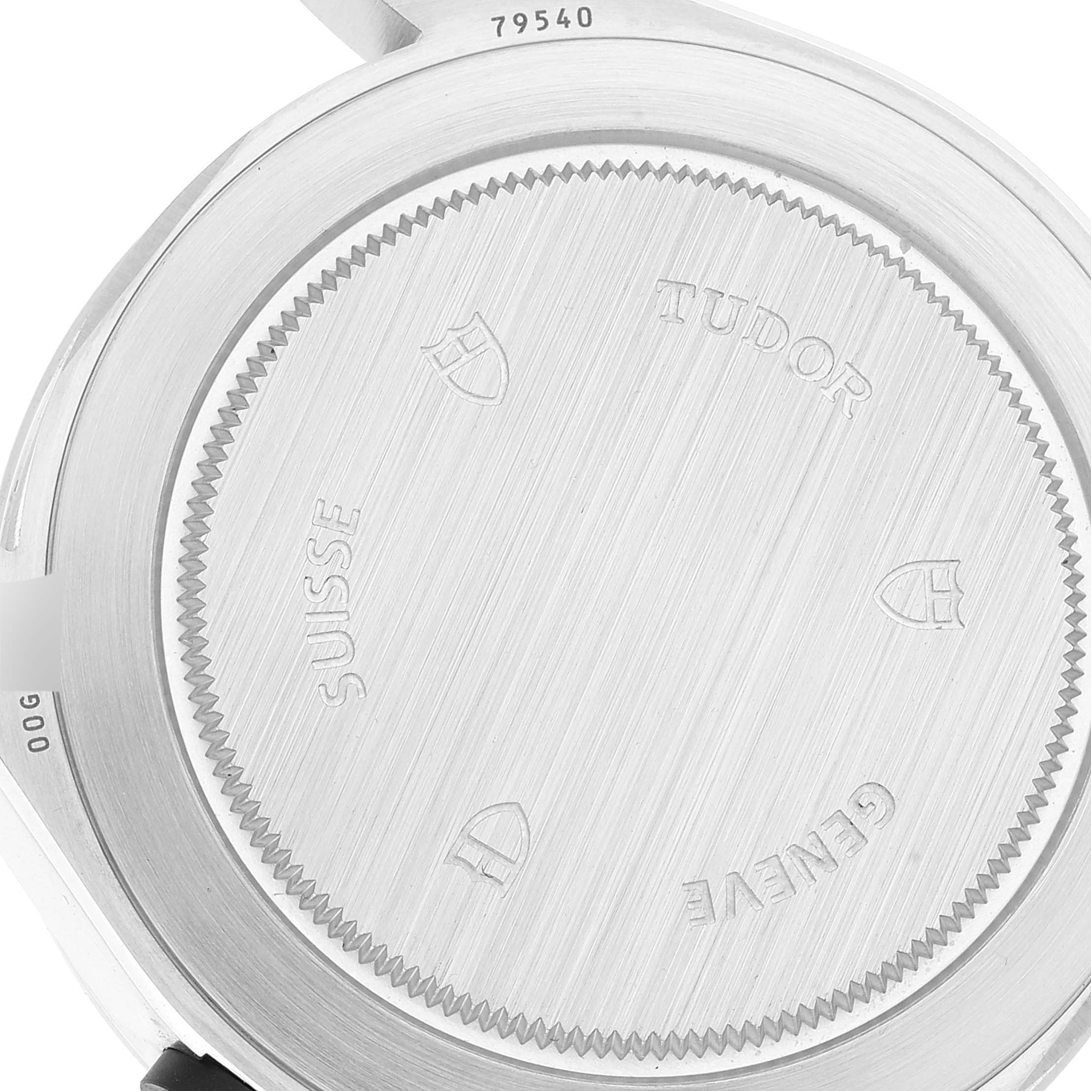 The image shows the back casing of a Tudor Heritage Black Bay 79540 Men's Stainless Steel Black Dial 79540 Men's Stainless Steel Black Dial watch, featuring engraved text and the model number 79540.