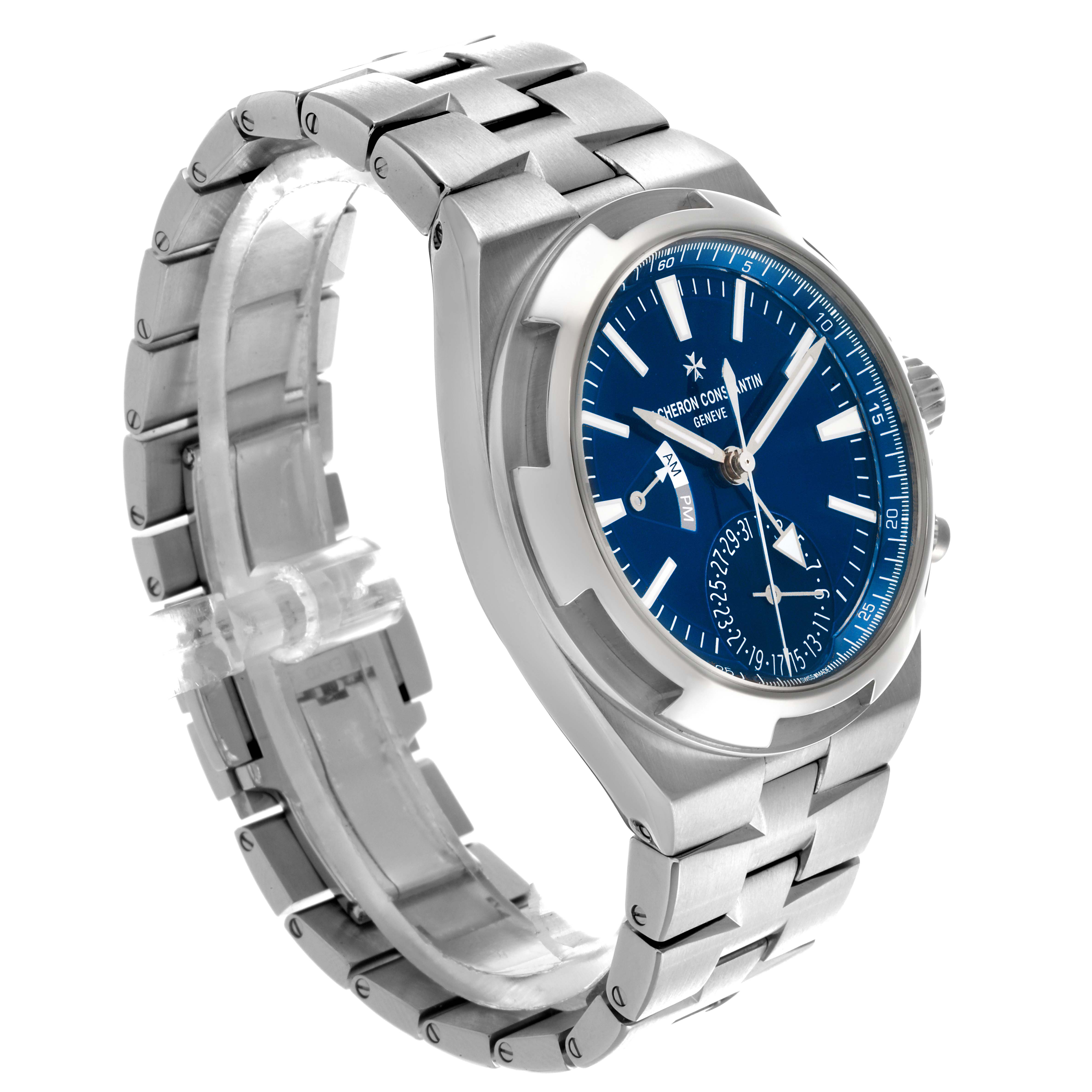 The Vacheron Constantin Overseas 7900V/110A-B334 Men's Stainless Steel Blue Dial 7900V/110A-B334 Men's Stainless Steel Blue Dial watch is shown at a three-quarter angle, highlighting the blue dial, bezel, and metal bracelet.