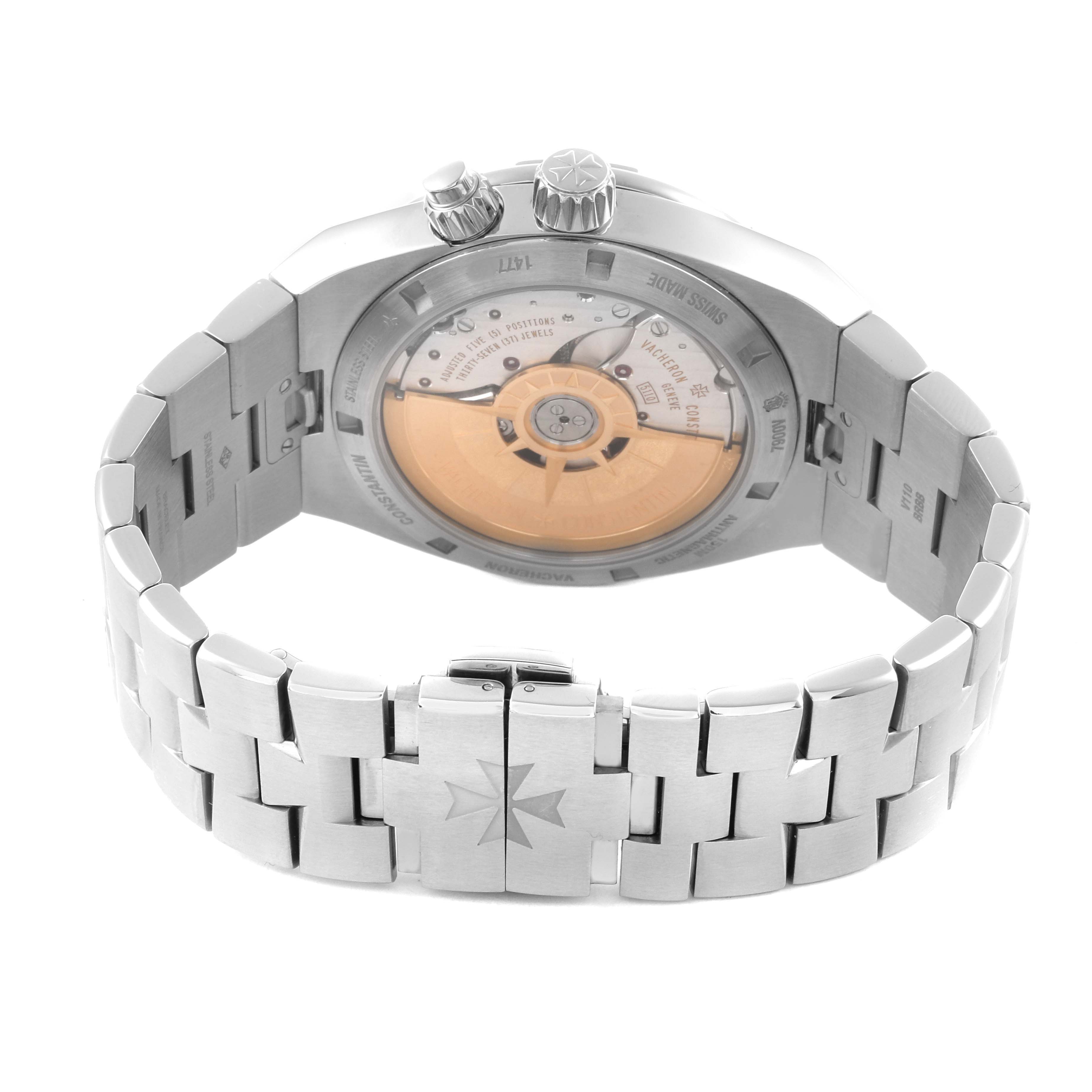 The image shows the back view of a Vacheron Constantin Overseas 7900V/110A-B334 Men's Stainless Steel Blue Dial 7900V/110A-B334 Men's Stainless Steel Blue Dial watch, highlighting the movement and bracelet.