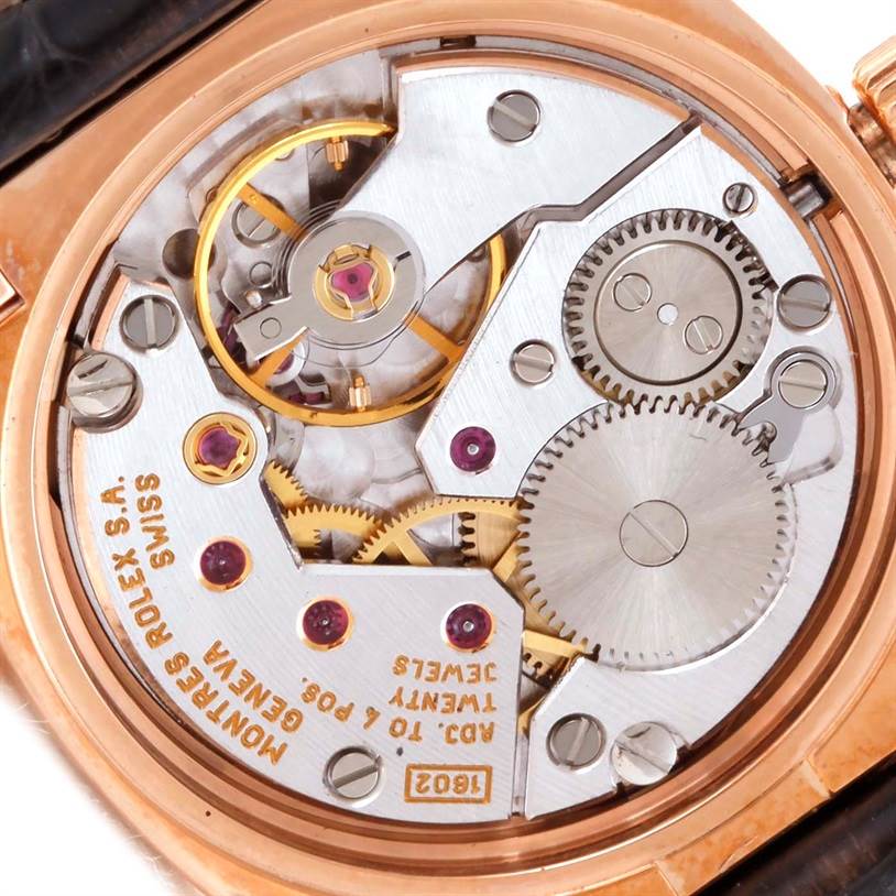 This image shows the intricate inner workings and mechanical parts of a Rolex Cellini 5310 Women's Rose Gold Grey Dial 5310 Women's Rose Gold Grey Dial watch from a close-up, rear view angle.