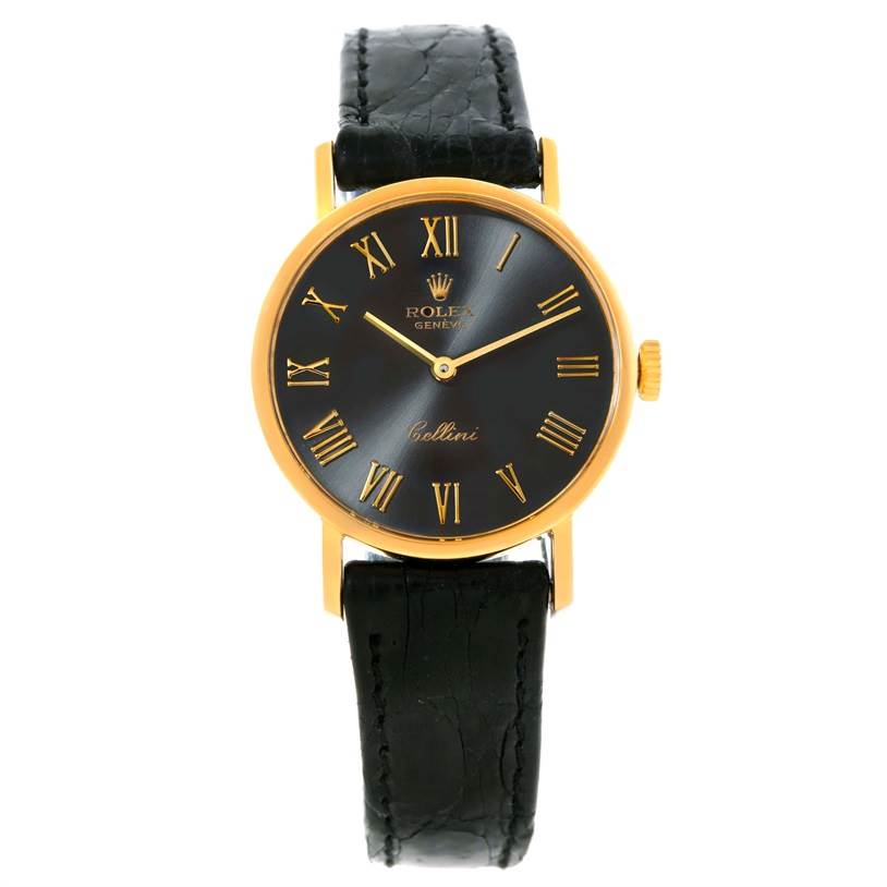 The image shows the front view of a Rolex Cellini 5109 Women's Yellow Gold Grey Dial 5109 Women's Yellow Gold Grey Dial watch, highlighting the black dial, gold case, and black leather strap.