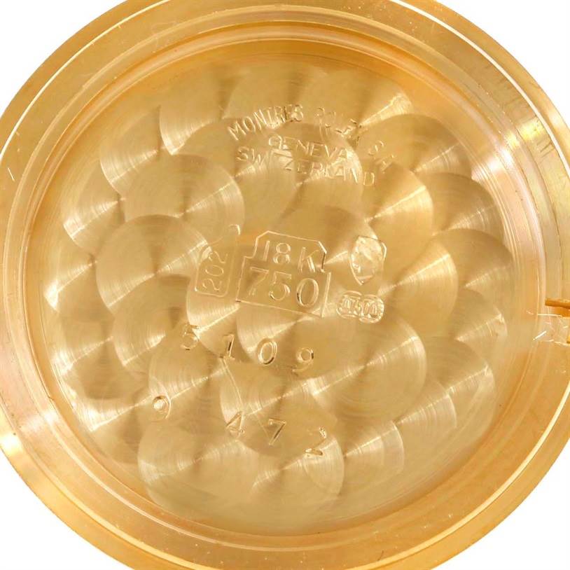 This image shows the inner case back of a Rolex Cellini 5109 Women's Yellow Gold Grey Dial 5109 Women's Yellow Gold Grey Dial watch, displaying hallmark engravings and gold content markings.