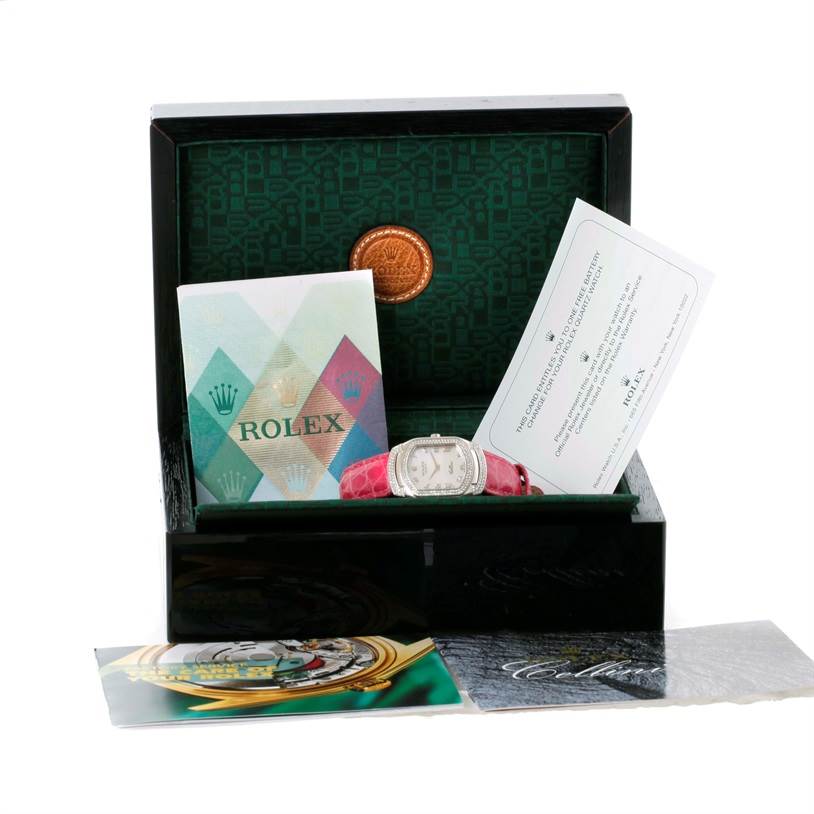 The image shows a Rolex Cellini 6691 Women's White Gold Mother of Pearl Dial 6691 Women's White Gold Mother of Pearl Dial watch inside an open box with accompanying documents displayed.