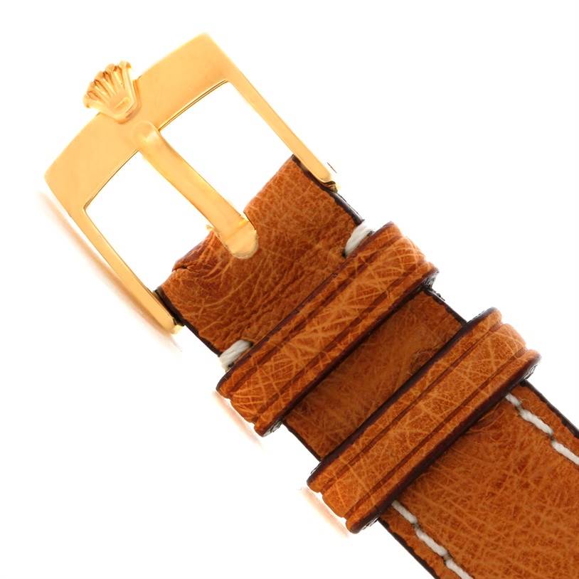 This image shows a close-up of the leather strap and gold buckle of a Rolex Cellini 6229 Women's Yellow Gold White Dial 6229 Women's Yellow Gold White Dial watch.