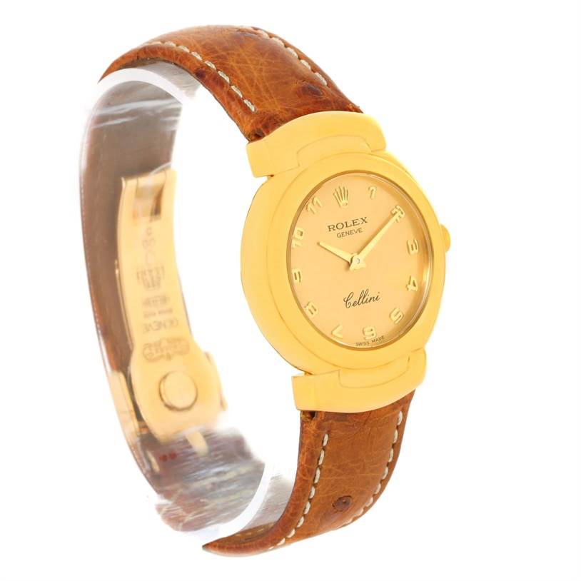 This image shows a Rolex Cellini 6621 Women's Yellow Gold Champagne Dial 6621 Women's Yellow Gold Champagne Dial watch at a three-quarter angle, highlighting the watch face, case, and leather strap.