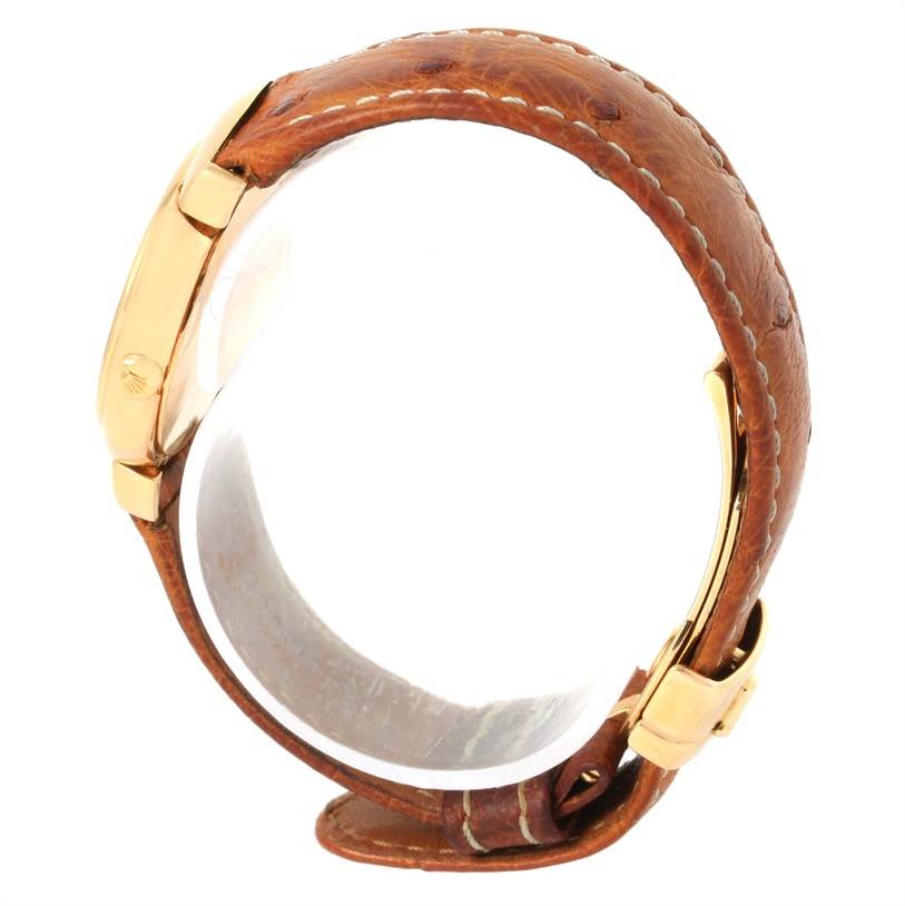 This side-angle view shows the case and brown leather strap of the Rolex Cellini 6621 Women's Yellow Gold Champagne Dial 6621 Women's Yellow Gold Champagne Dial watch.