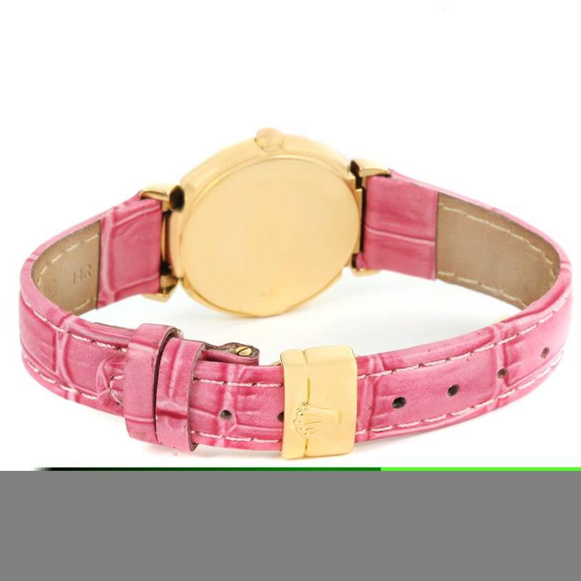 The image shows the back view of a Rolex Cellini 6621 Women's Yellow Gold Beige Dial 6621 Women's Yellow Gold Beige Dial watch with a pink leather strap and a gold clasp.