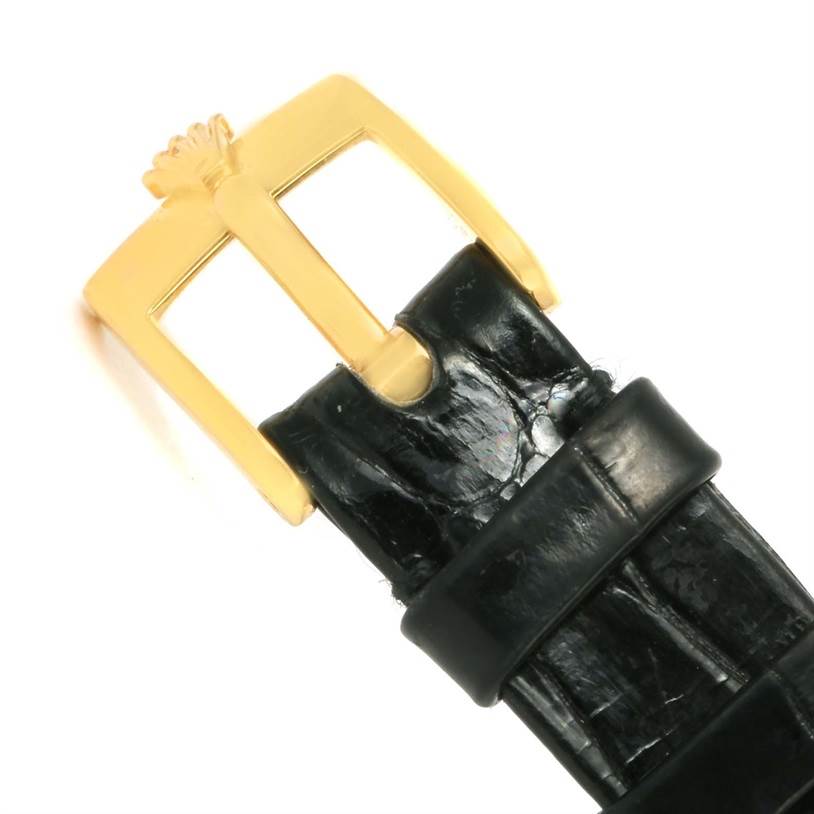 The image shows a close-up of the gold buckle and black leather strap of a Rolex Cellini 5109 Women's Yellow Gold Beige Dial 5109 Women's Yellow Gold Beige Dial watch.