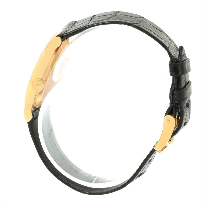 The image shows a side profile of a Rolex Cellini 5109 Women's Yellow Gold Beige Dial 5109 Women's Yellow Gold Beige Dial watch, highlighting its gold case, black leather strap, and clasp.