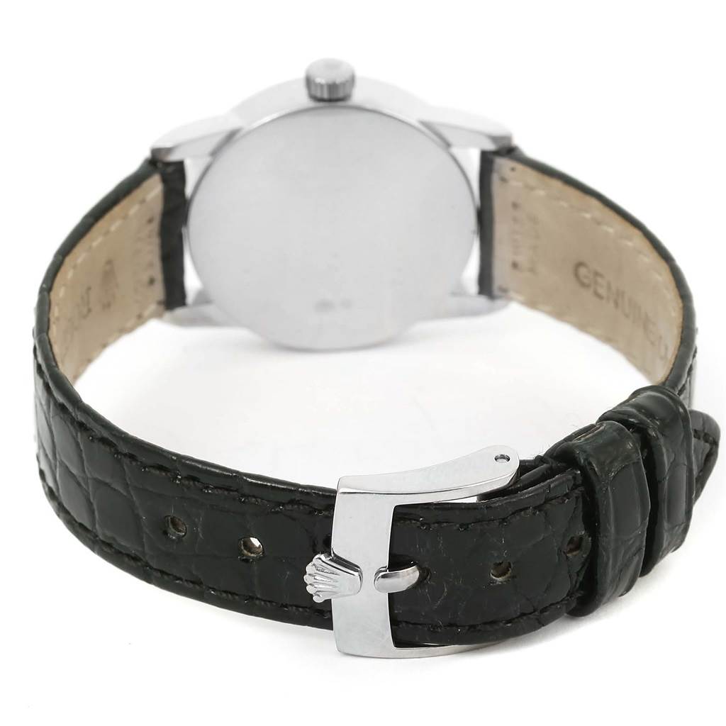 The image shows the back view of a Rolex Cellini 6111 Women's White Gold Black Dial 6111 Women's White Gold Black Dial watch, highlighting the strap, buckle, and case back.