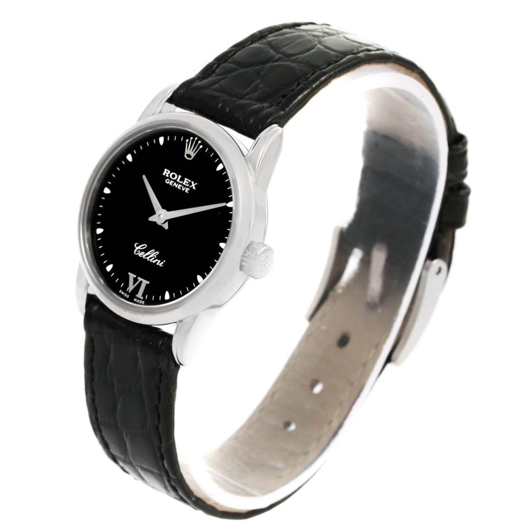 The image shows a Rolex Cellini 6111 Women's White Gold Black Dial 6111 Women's White Gold Black Dial watch at a slight angle, displaying its black dial, silver case, crown, and black leather strap.