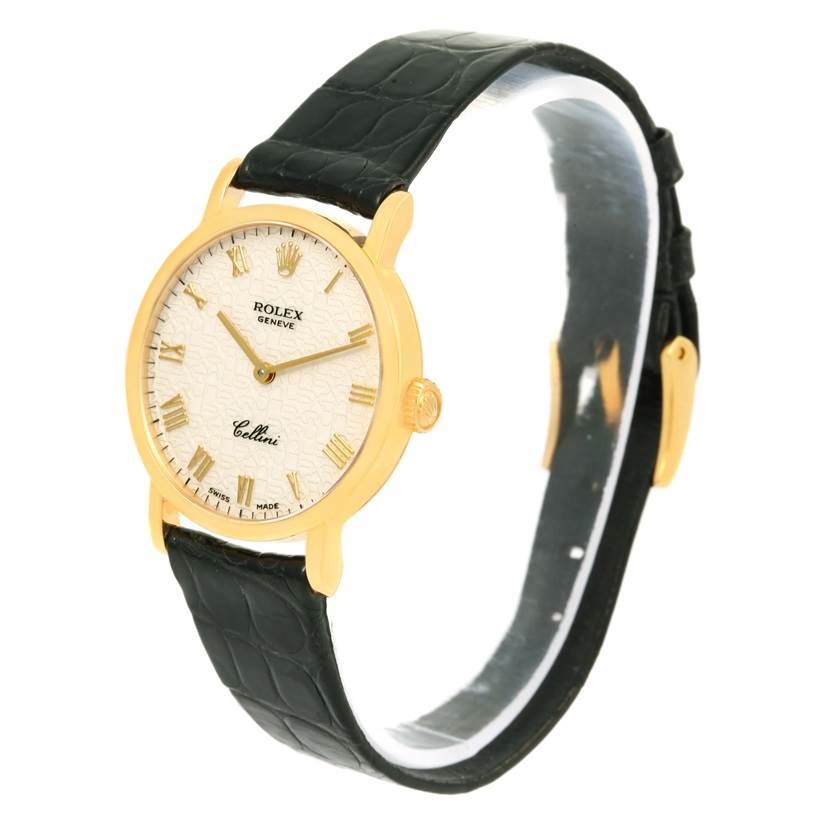 The Rolex Cellini 5109 Women's Yellow Gold Beige Dial 5109 Women's Yellow Gold Beige Dial watch is shown at a front angled view, displaying its face, crown, and black leather strap.