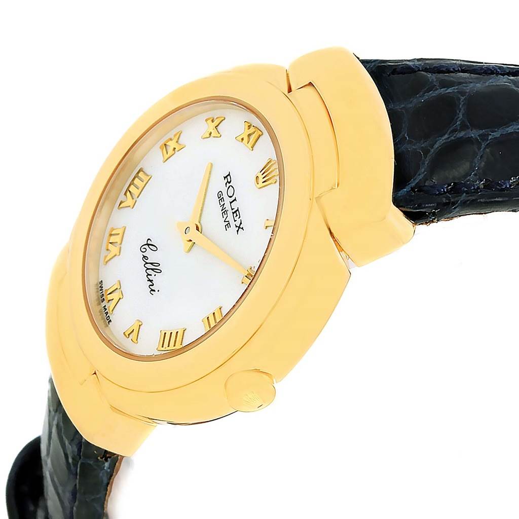 The image shows a close-up of the Rolex Cellini 6621 Women's Yellow Gold White Dial 6621 Women's Yellow Gold White Dial watch, focusing on its gold case, white dial with Roman numerals, and part of the black strap.