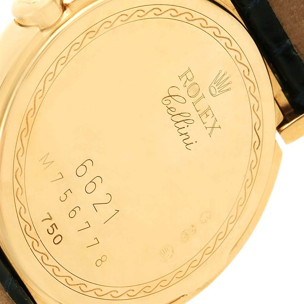 This image shows the gold case back of a Rolex Cellini 6621 Women's Yellow Gold White Dial 6621 Women's Yellow Gold White Dial model, displaying the brand name, model name, and serial/carriage numbers.