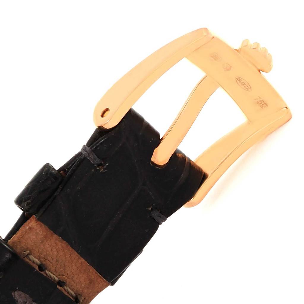 This image shows a close-up of the buckle and part of the leather strap of a Rolex Cellini 5310 Women's Rose Gold Grey Dial 5310 Women's Rose Gold Grey Dial watch.