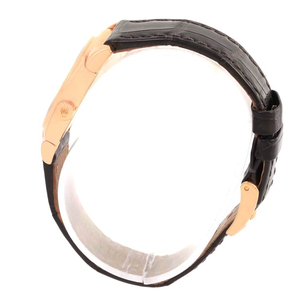 This image shows a side view of the Rolex Cellini 5310 Women's Rose Gold Grey Dial 5310 Women's Rose Gold Grey Dial model watch with a focus on its leather strap and gold clasp.