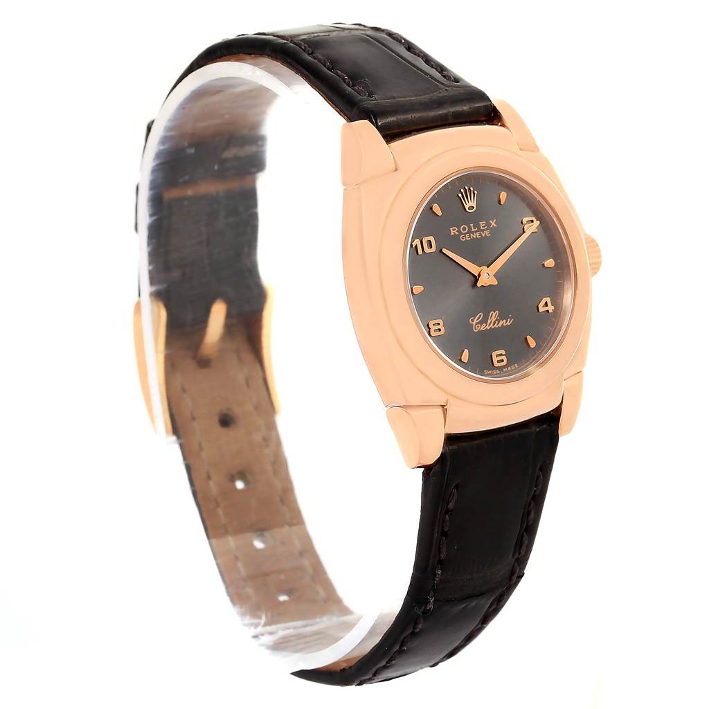 The Rolex Cellini 5310 Women's Rose Gold Grey Dial 5310 Women's Rose Gold Grey Dial watch is angled to show the black leather strap, gold case, and black dial with gold markers and hands.