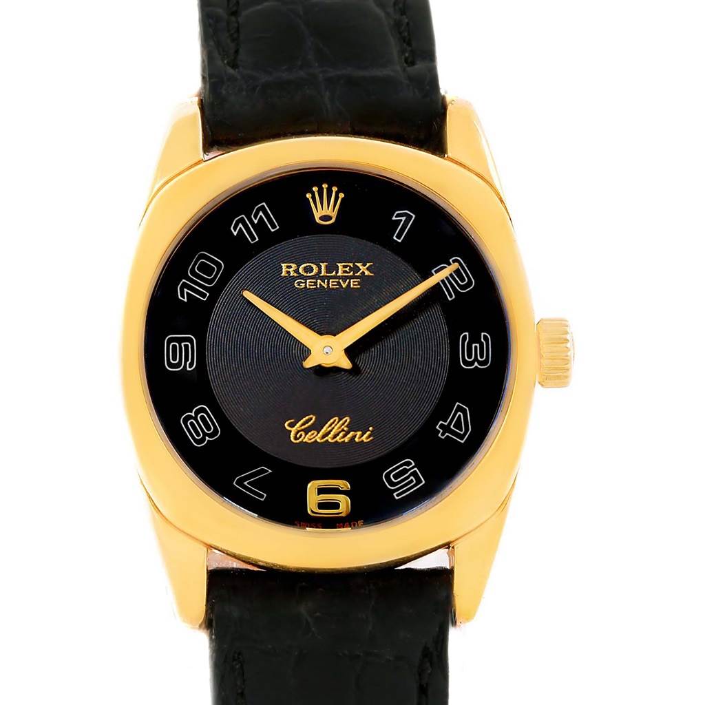 The Rolex Cellini 6229 Women's Yellow Gold Black Dial 6229 Women's Yellow Gold Black Dial watch is shown from a front angle, displaying the dial, hands, and part of the strap.