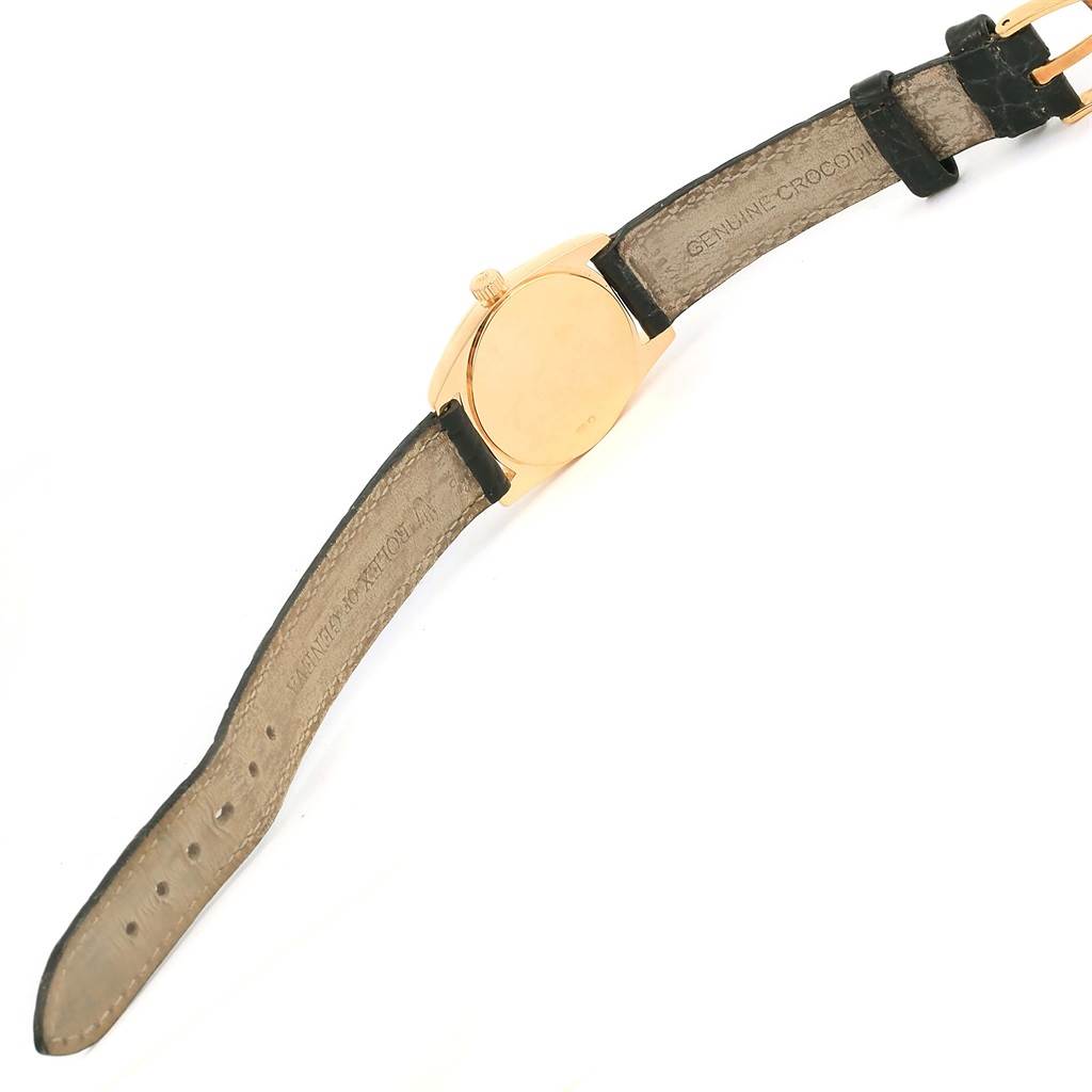 The image shows the back and strap of a Rolex Cellini 6229 Women's Yellow Gold Black Dial 6229 Women's Yellow Gold Black Dial watch, positioned flat with the case and leather strap visible.