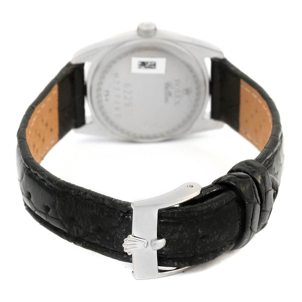 The image shows the back and strap of a Rolex Cellini 6229 Women's White Gold White Dial 6229 Women's White Gold White Dial watch, highlighting the clasp and leather band.