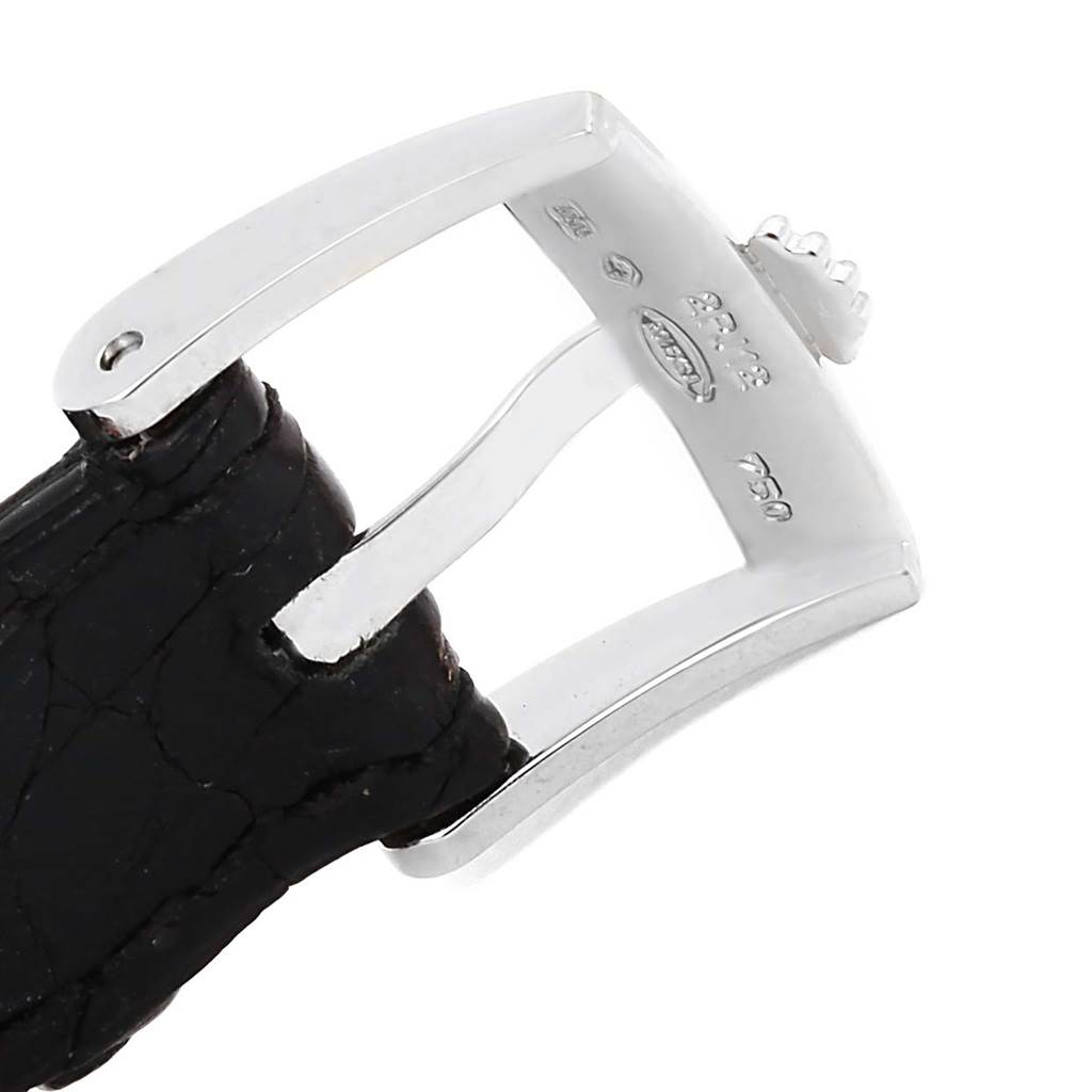 This image shows a close-up of the clasp and part of the leather strap of a Rolex Cellini 6229 Women's White Gold White Dial 6229 Women's White Gold White Dial watch.