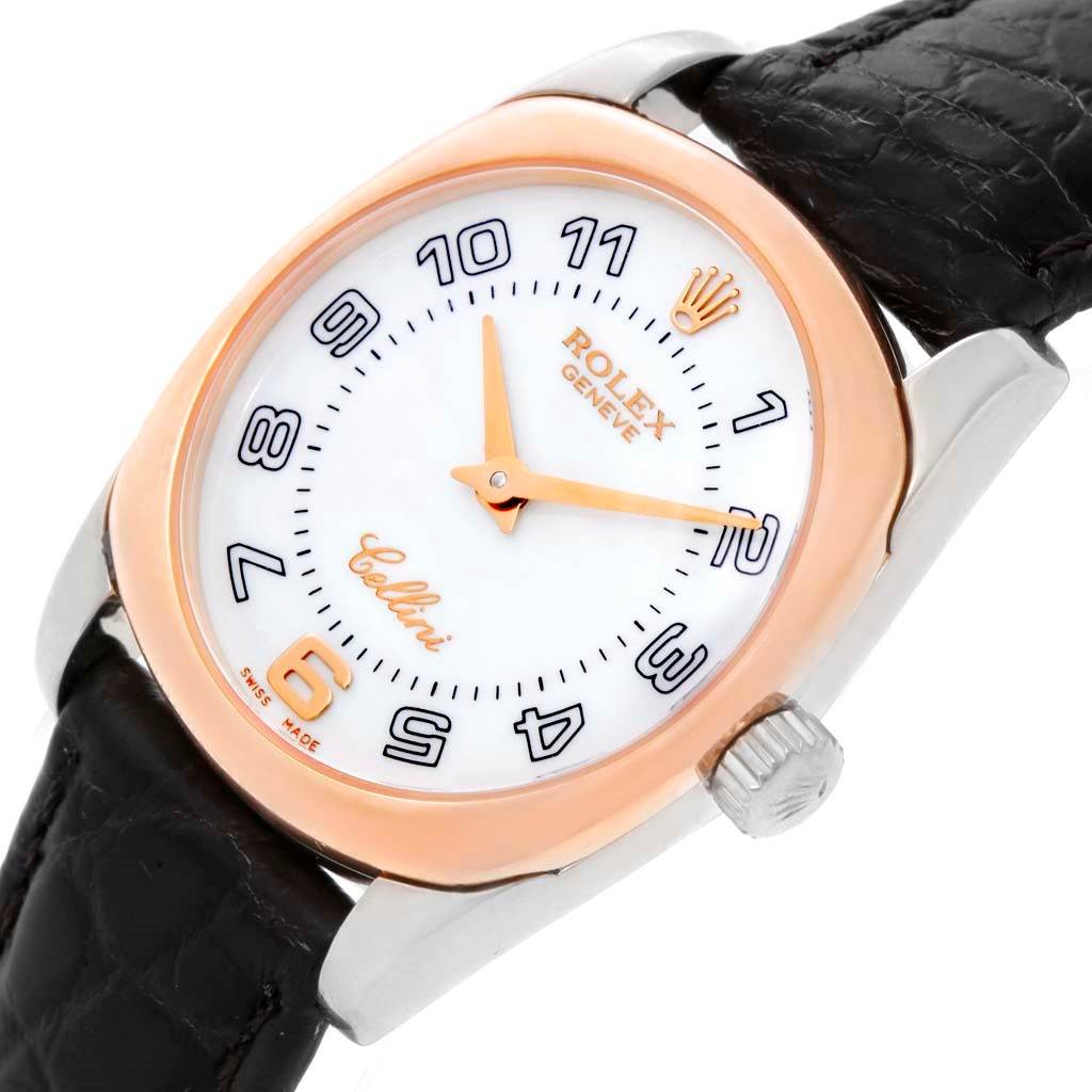 The Rolex Cellini 6229 Women's White Gold White Dial 6229 Women's White Gold White Dial watch is shown at an angled top view, highlighting the dial, crown, case, and black leather strap.