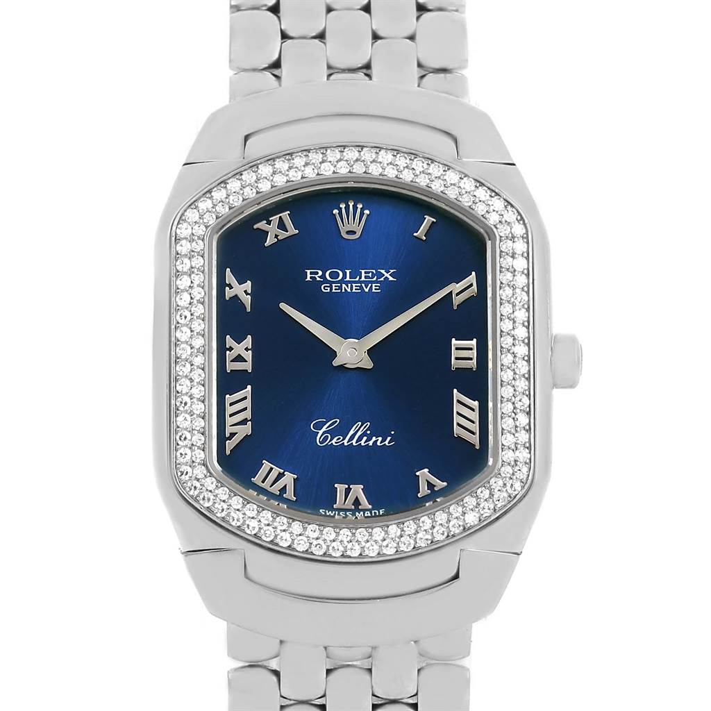 The Rolex Cellini 6691 Women
s White Gold Blue Dial 6691 Women
s White Gold Blue Dial watch is shown from a front angle, highlighting its blue dial, diamond bezel, and part of its metal bracelet.