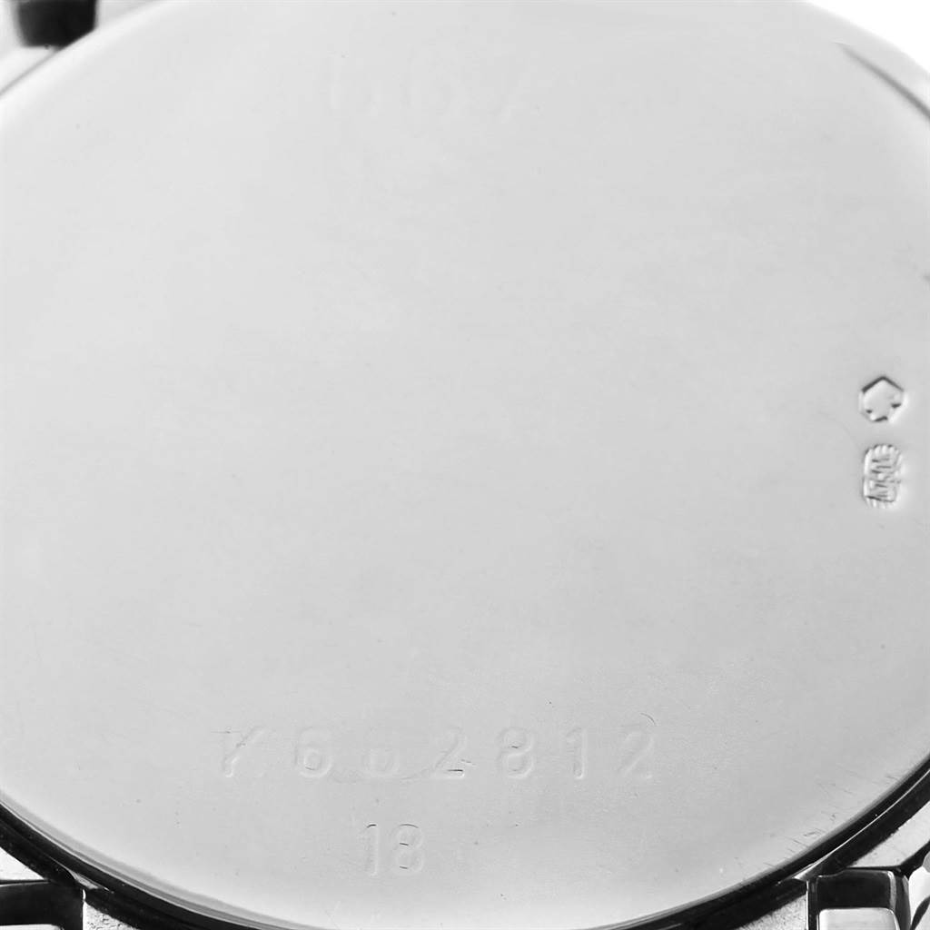 The image shows the back case of a Rolex Cellini 6671 Women's White Gold White Dial 6671 Women's White Gold White Dial watch, focusing on the case's inscriptions and close-up details.