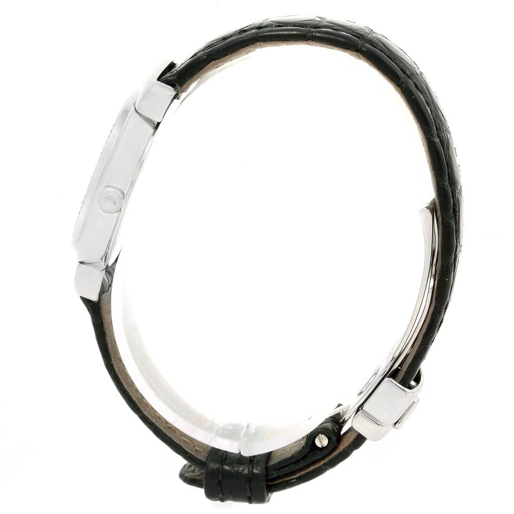 The image shows a side view of a Rolex Cellini 6671 Women's White Gold White Dial 6671 Women's White Gold White Dial watch, highlighting its case, crown, and leather strap with a buckle.