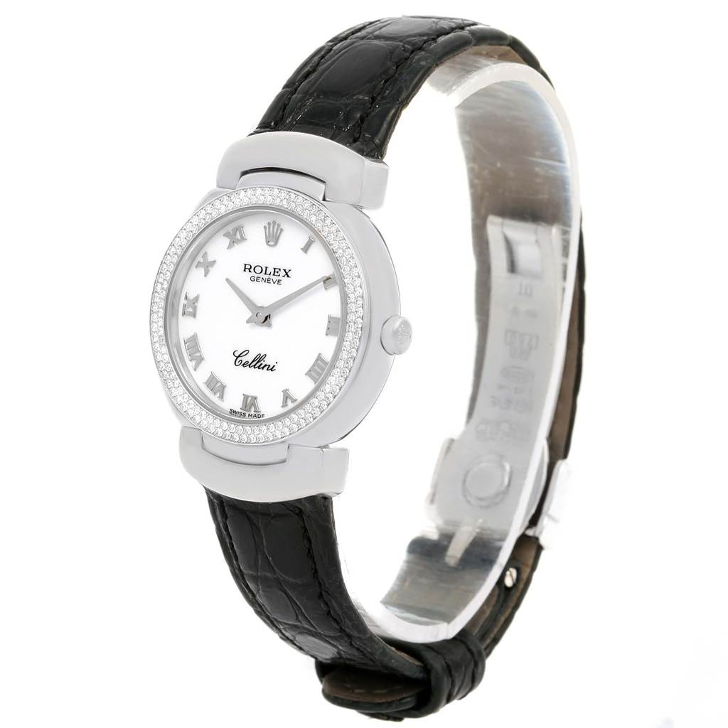 The image shows a side angle of a Rolex Cellini 6671 Women's White Gold White Dial 6671 Women's White Gold White Dial watch, displaying the face, bezel, and leather strap.
