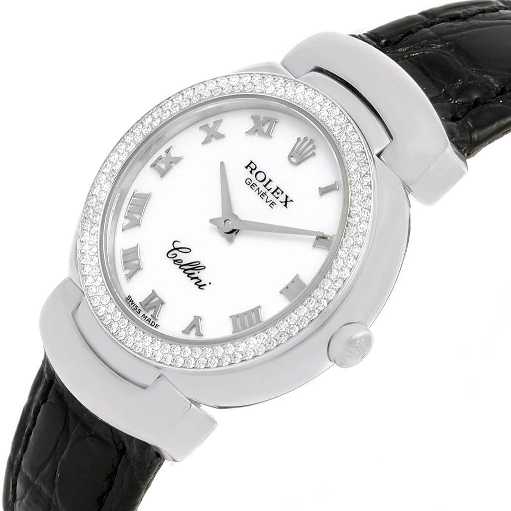 A black and white Rolex Cellini 6671 Women's White Gold White Dial 6671 Women's White Gold White Dial watch is shown at a slight angle, highlighting the face, bezel, and part of the strap.