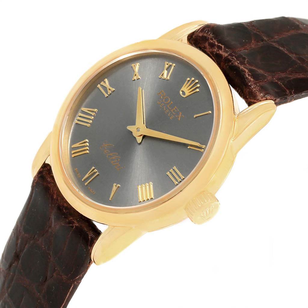 This image shows a Rolex Cellini 6111 Women's Yellow Gold Grey Dial 6111 Women's Yellow Gold Grey Dial watch angled from the front-left, highlighting its dial, crown, and leather strap.