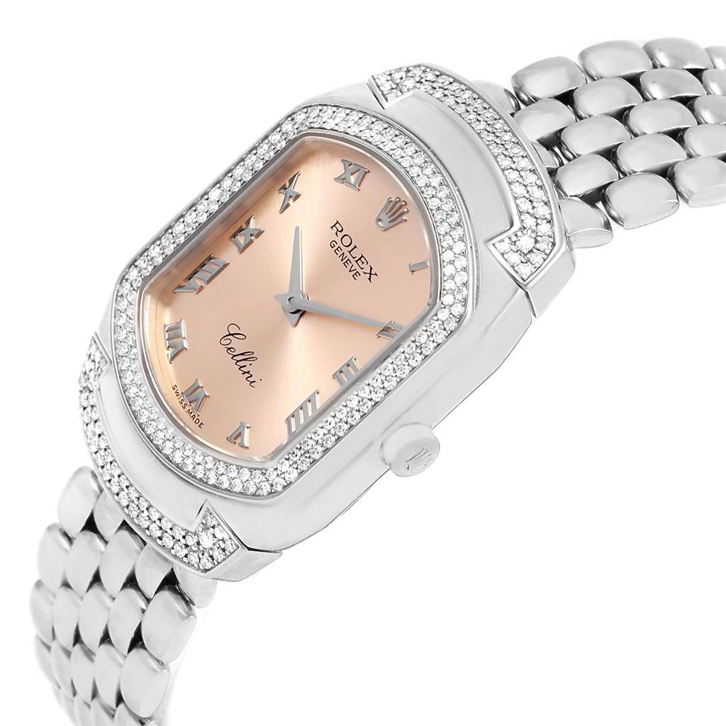 The image shows a Rolex Cellini 6693 Women
s White Gold Pink Dial 6693 Women
s White Gold Pink Dial watch at an angle displaying its face, bezel, and part of the bracelet.