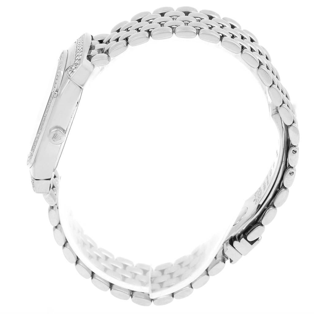 The image shows a side view of the Rolex Cellini 6693 Women
s White Gold Pink Dial 6693 Women
s White Gold Pink Dial watch, displaying its crown, case, and bracelet.