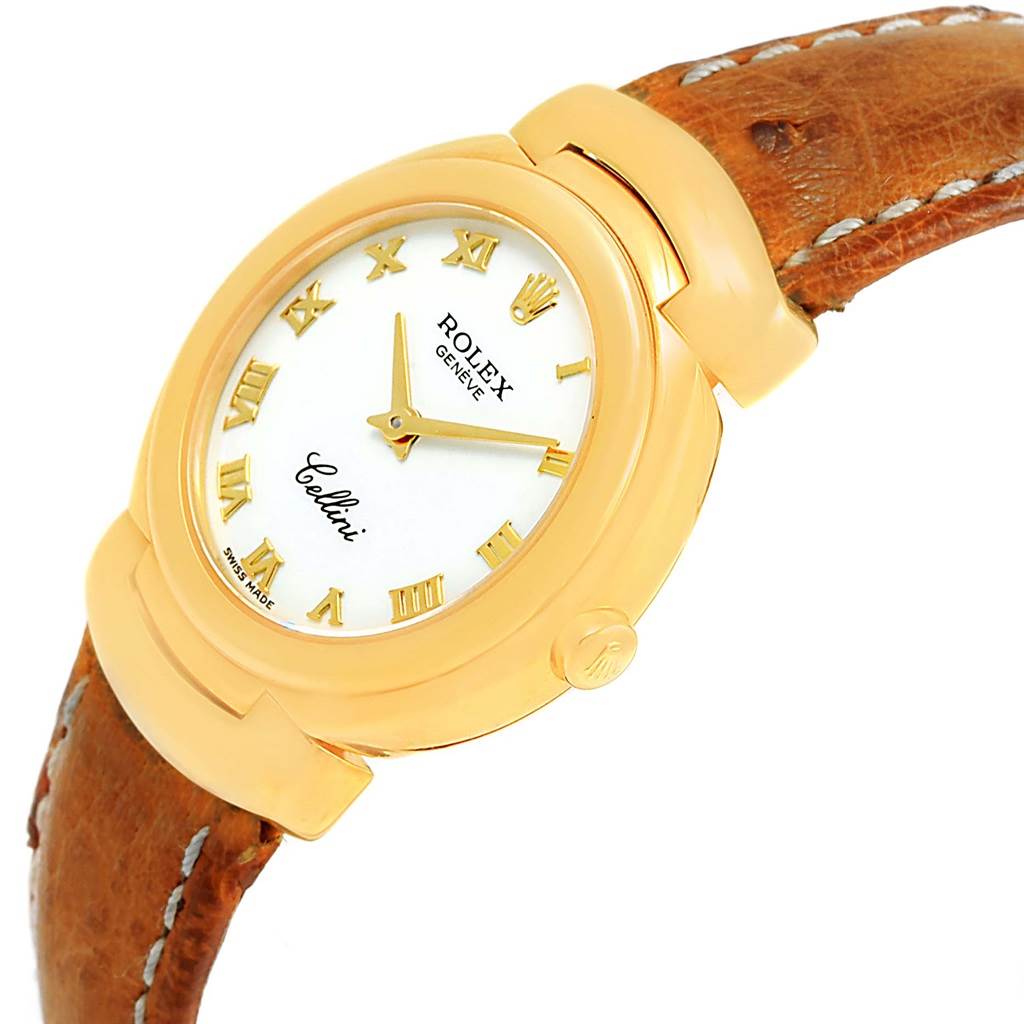 The image shows a Rolex Cellini 6621 Women's Yellow Gold White Dial 6621 Women's Yellow Gold White Dial watch at an angled top view featuring the dial, crown, and leather strap.