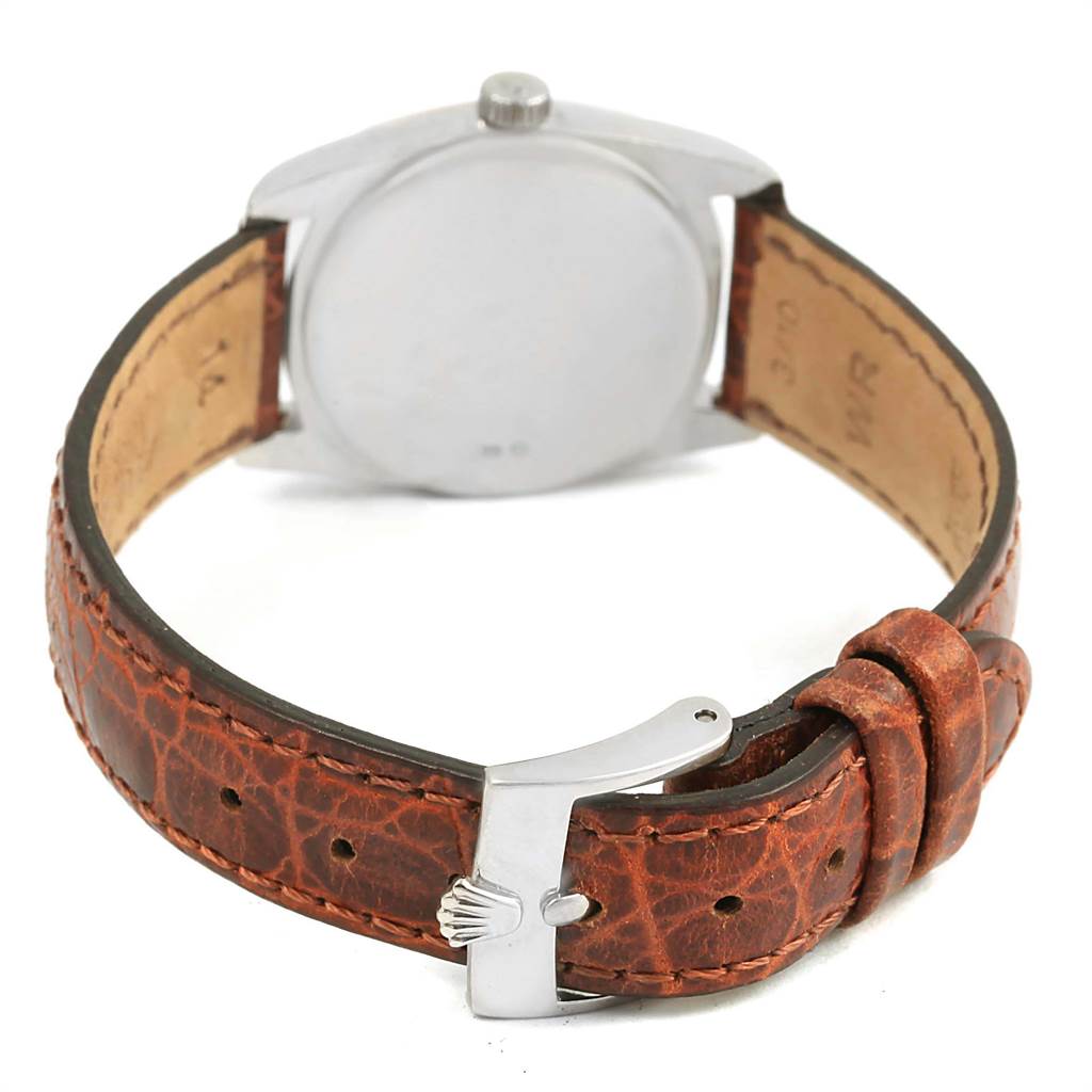 This image shows the back view of a Rolex Cellini 6229 Women's White Gold White Dial 6229 Women's White Gold White Dial watch, highlighting the case back, brown leather strap, and clasp.