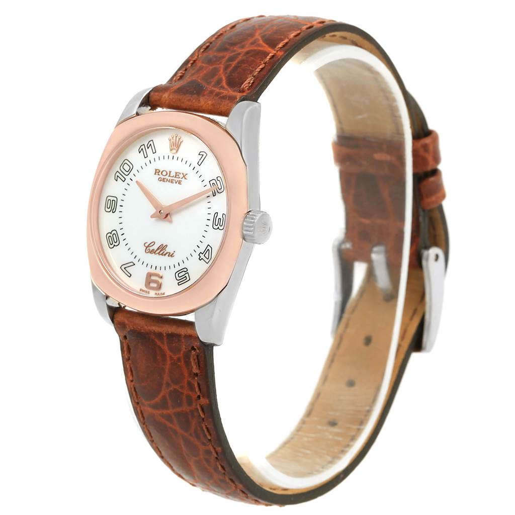 This image shows a Rolex Cellini 6229 Women's White Gold White Dial 6229 Women's White Gold White Dial watch, angled to display its face, bezel, crown, and leather strap.