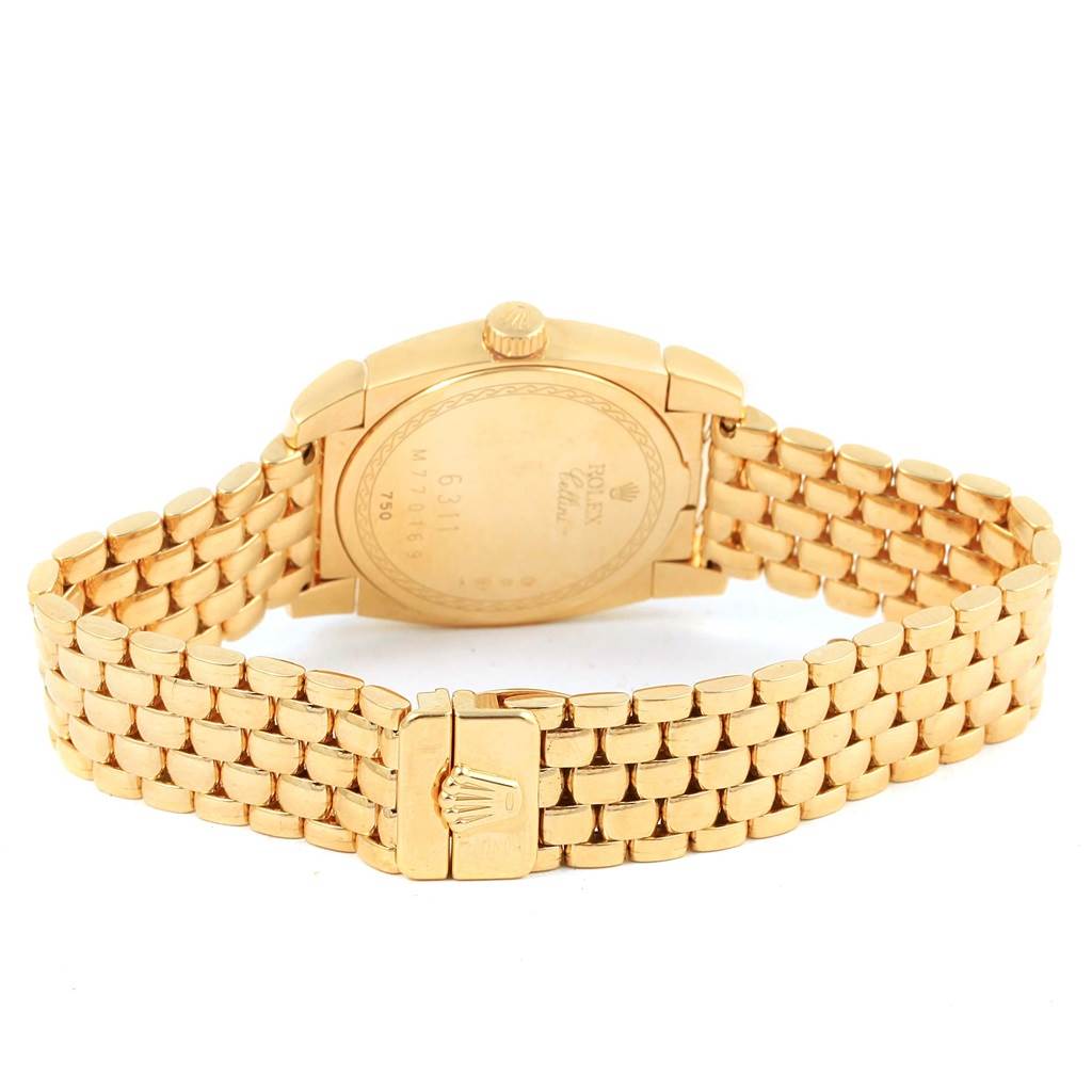 The image shows the back view of a Rolex Cellini 6311 Women's Yellow Gold Mother of Pearl Dial 6311 Women's Yellow Gold Mother of Pearl Dial watch, highlighting its bracelet, clasp, and case back.