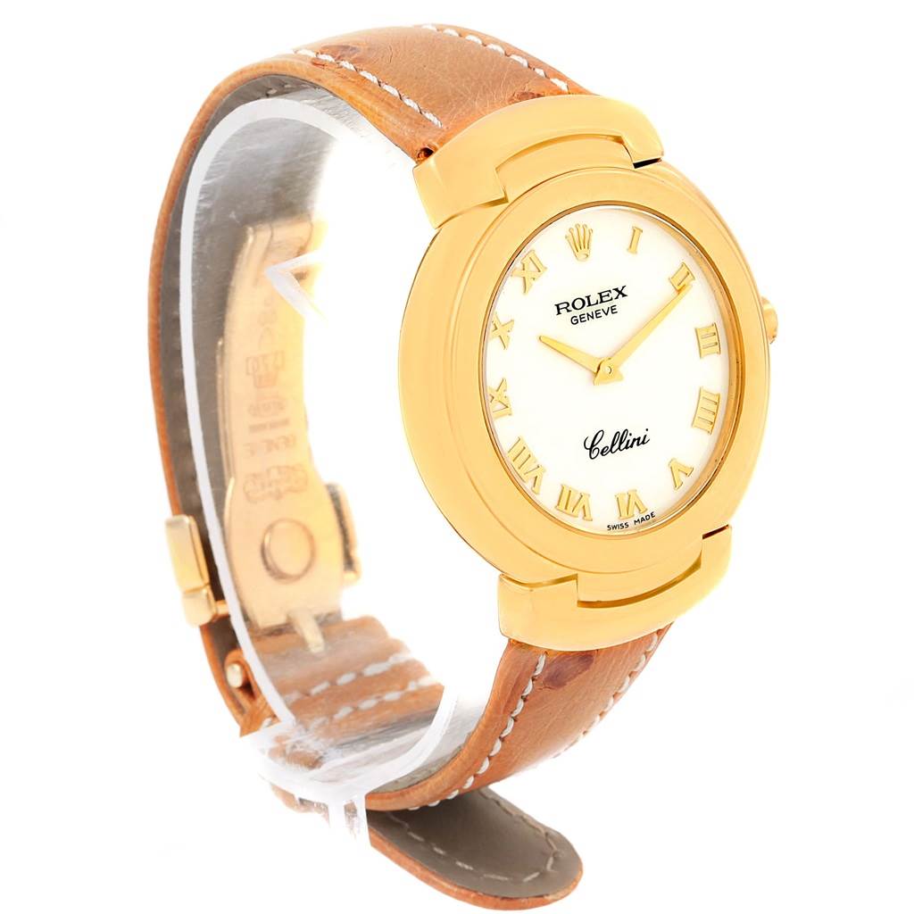 The Rolex Cellini 6622 Women's Yellow Gold White Dial 6622 Women's Yellow Gold White Dial model watch is shown from a side angle, displaying the face, bezel, and leather strap.