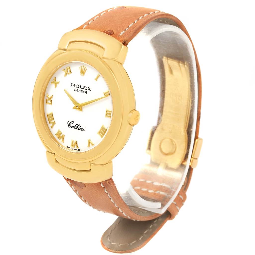 The Rolex Cellini 6622 Women's Yellow Gold White Dial 6622 Women's Yellow Gold White Dial watch is shown at an angled view, displaying the gold case, white dial with Roman numerals, and brown leather strap.