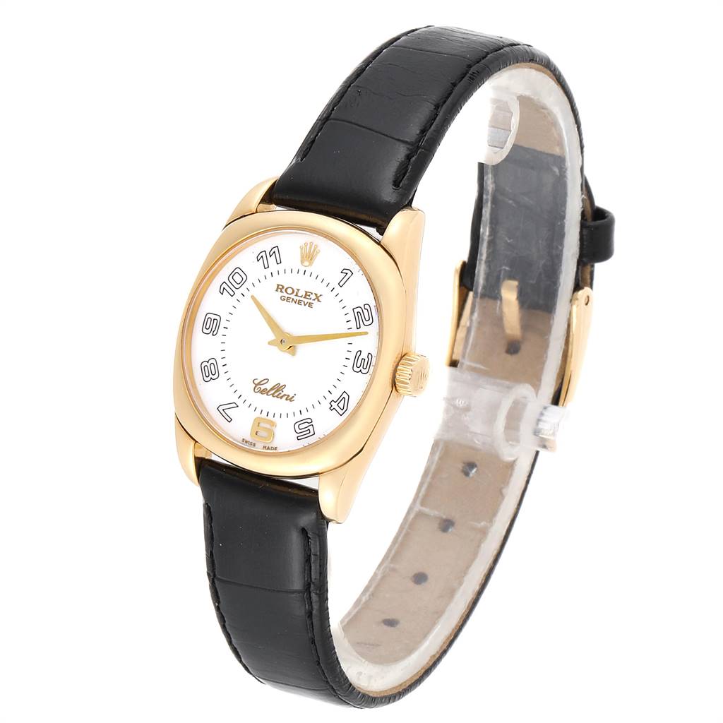 The image shows a front angle of a Rolex Cellini 6229 Women
s Yellow Gold White Dial 6229 Women
s Yellow Gold White Dial watch featuring its dial, case, and leather strap.