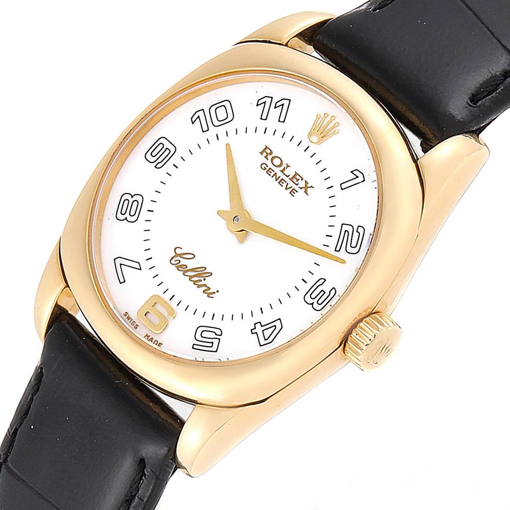 The image shows a close-up angled view of the face and partial strap of a Rolex Cellini 6229 Women
s Yellow Gold White Dial 6229 Women
s Yellow Gold White Dial watch.