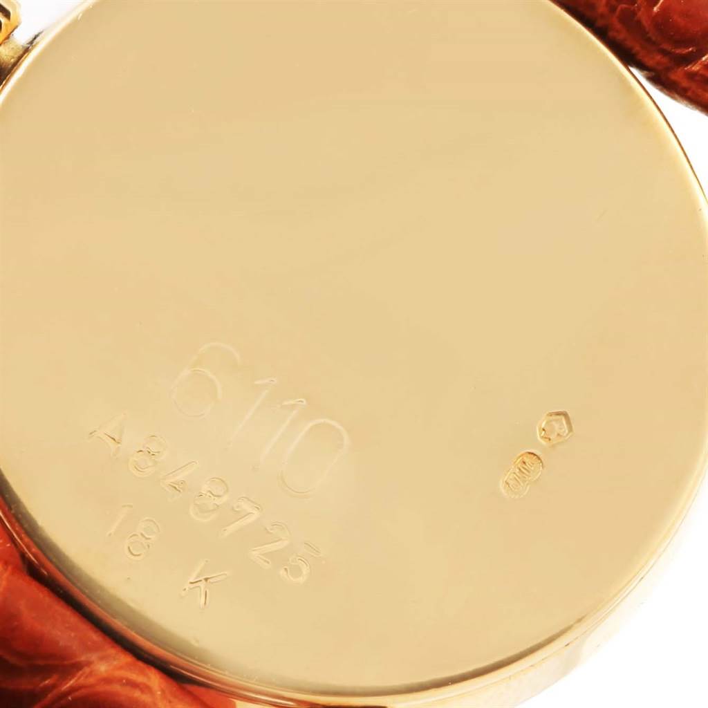 The image shows the back case of a Rolex Cellini 6610 Women's Yellow Gold Silver Dial 6610 Women's Yellow Gold Silver Dial watch, displaying its model number and gold stamp.