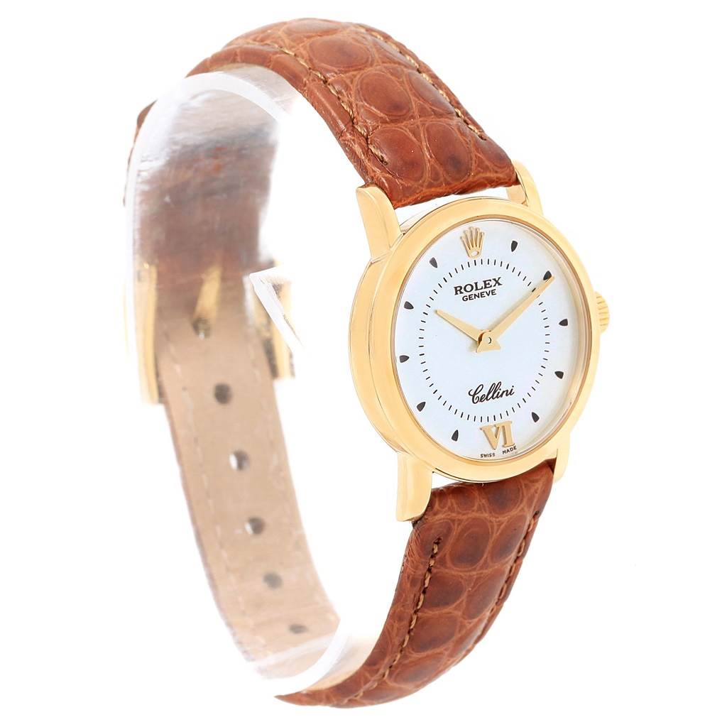 The image shows a Rolex Cellini 6610 Women's Yellow Gold Silver Dial 6610 Women's Yellow Gold Silver Dial watch at a slight angle, highlighting the dial and brown leather strap.