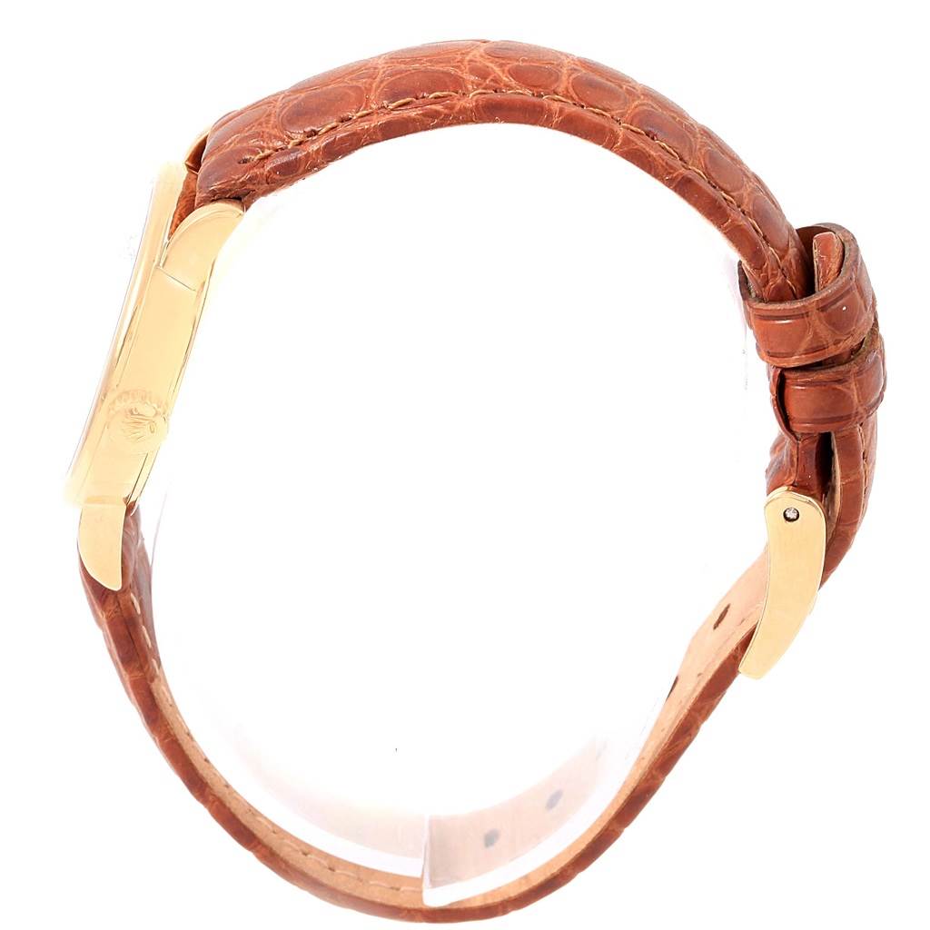 The image shows a side view of the Rolex Cellini 6610 Women's Yellow Gold Silver Dial 6610 Women's Yellow Gold Silver Dial model watch, highlighting its brown leather strap and clasp.