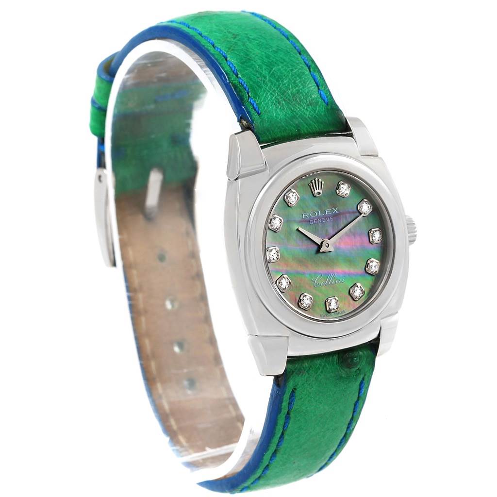 The Rolex Cellini 5310 Women's White Gold Mother of Pearl Dial 5310 Women's White Gold Mother of Pearl Dial watch is shown at a slight angle, displaying its face, bezel, and green strap.
