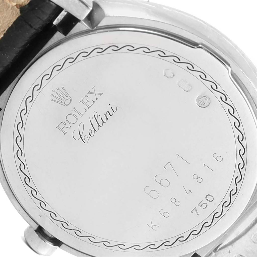This image shows the back case of a Rolex Cellini 6671 Women
s White Gold Silver Dial 6671 Women
s White Gold Silver Dial watch with engravings and markings visible.