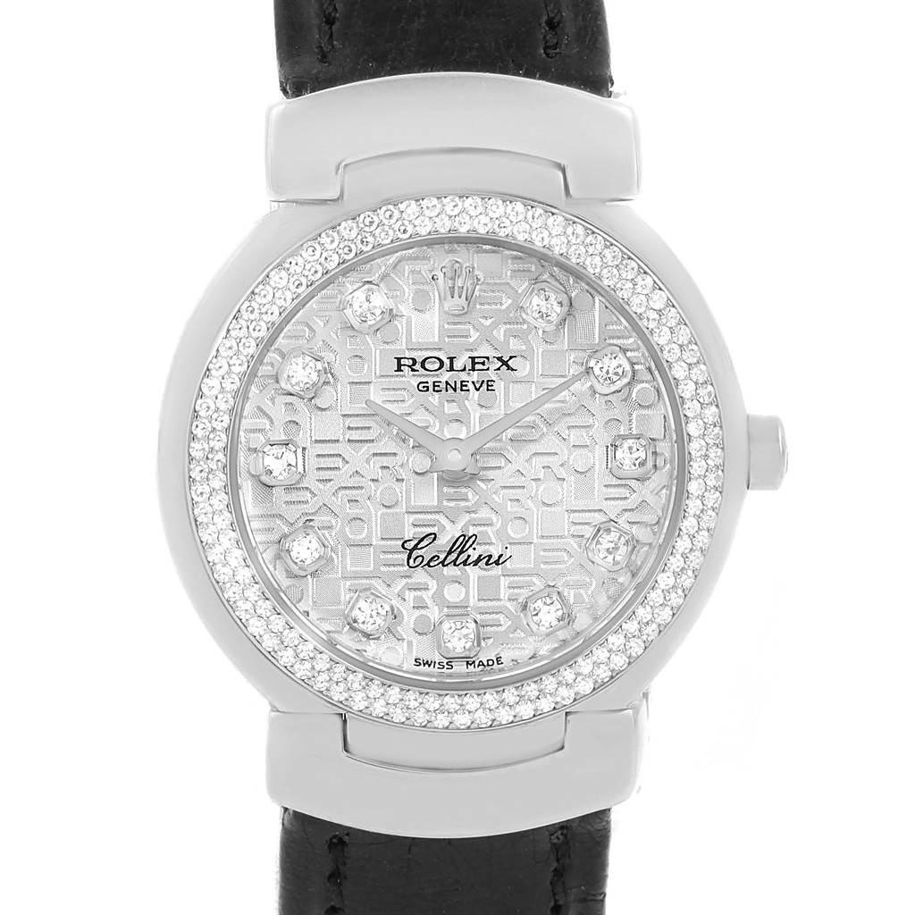 This image shows a front view of a Rolex Cellini 6671 Women
s White Gold Silver Dial 6671 Women
s White Gold Silver Dial watch, highlighting its dial, bezel, and a portion of its leather strap.