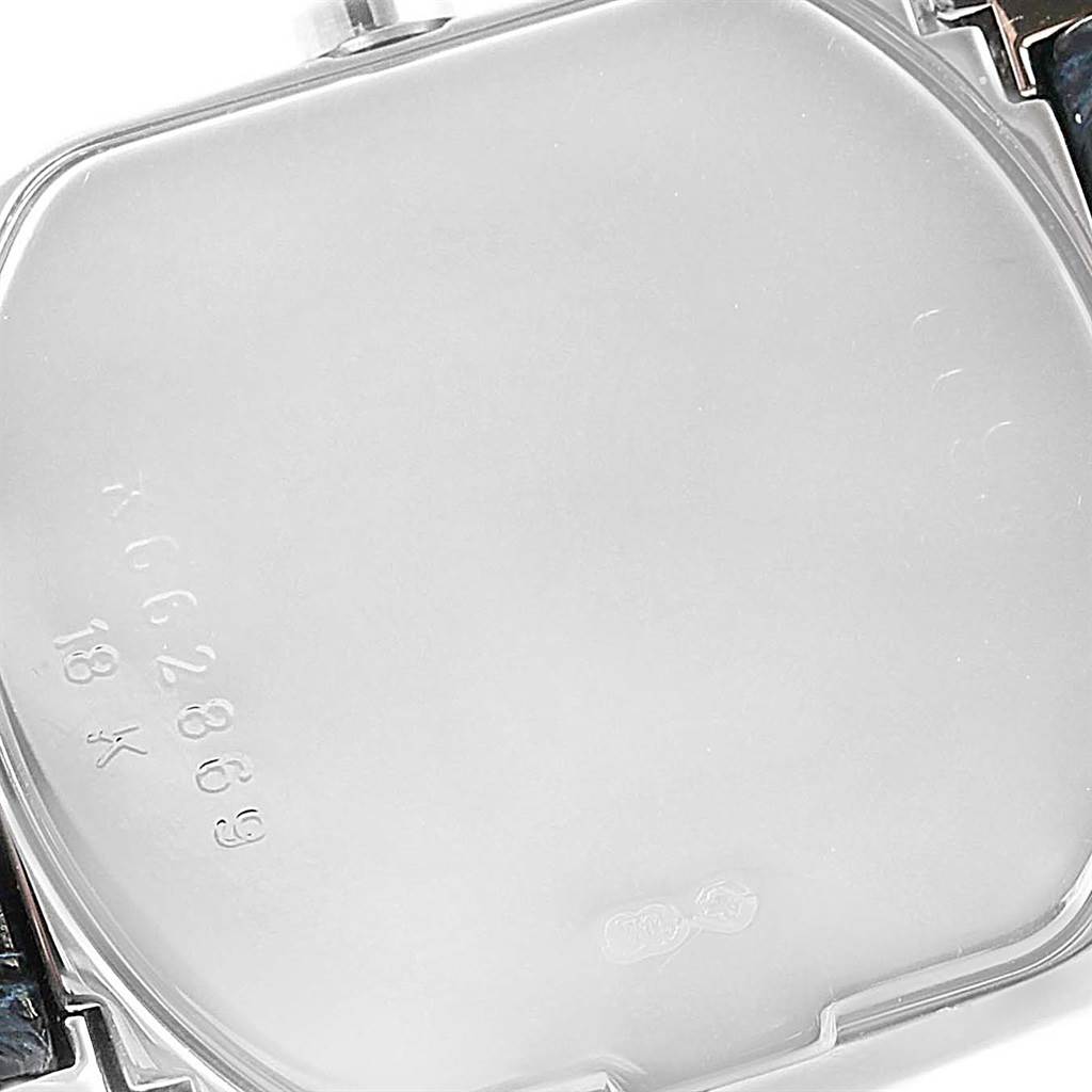 The image shows the back casing of a Rolex Cellini 6693 Women's White Gold White Dial 6693 Women's White Gold White Dial watch with visible engravings and part of the strap.